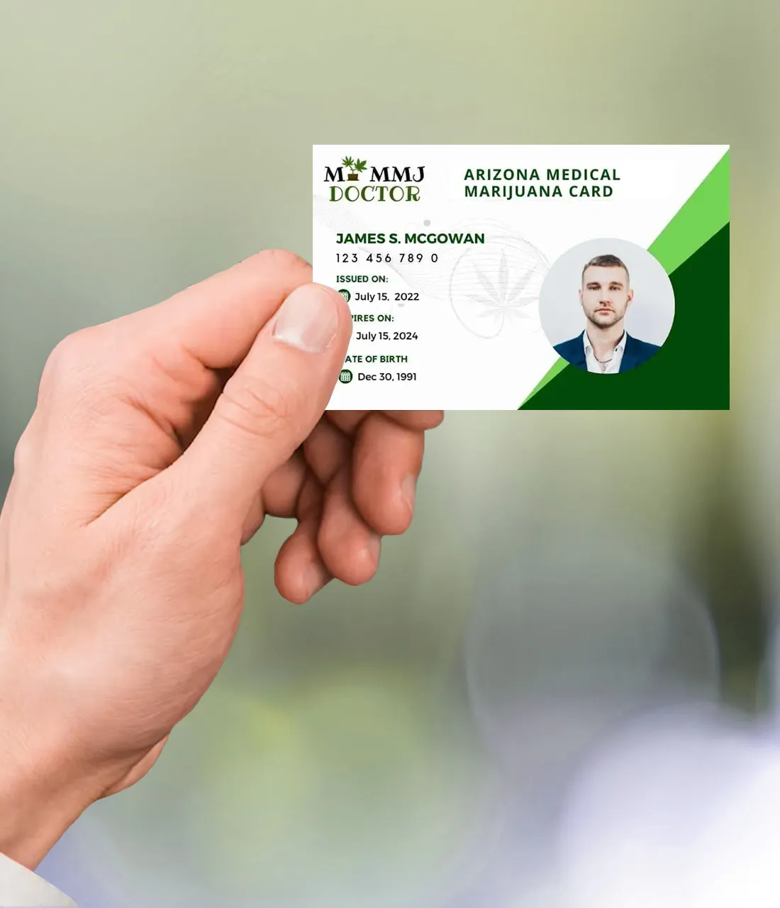 Hand holding Arizona medical cannabis card Hand holding Arizona medical cannabis card