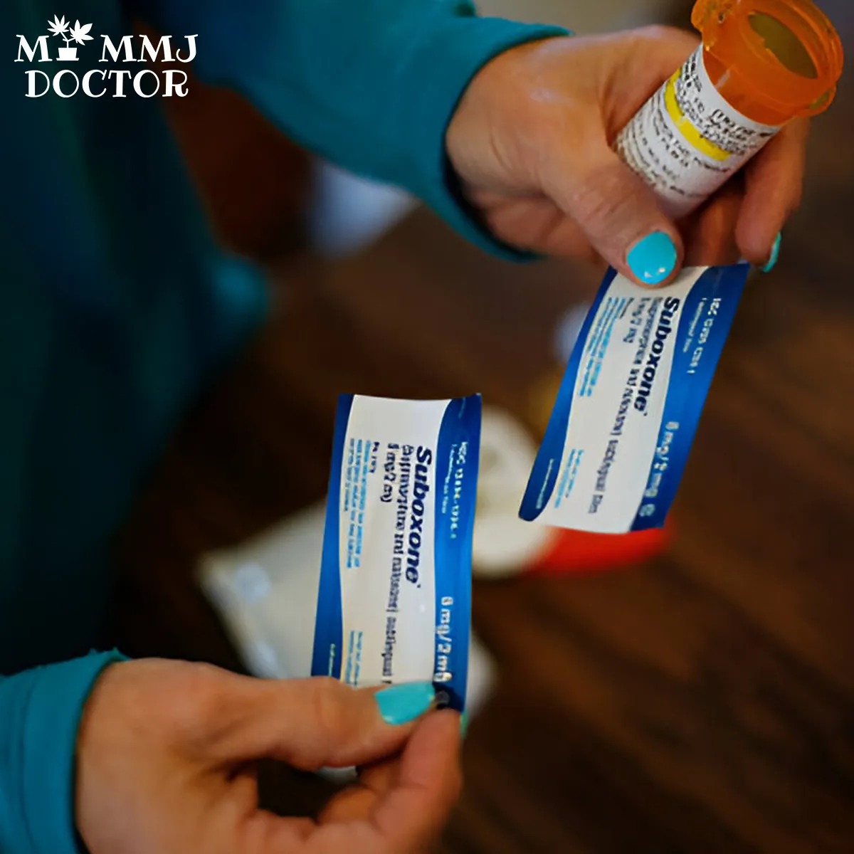 woman holding suboxone buccal film strips for addiction treatment woman holding suboxone buccal film strips for addiction treatment