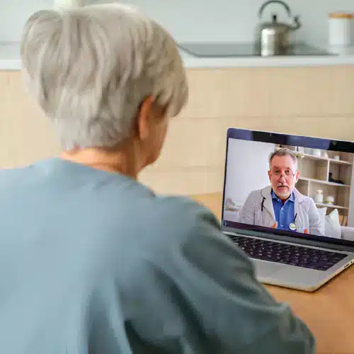 old women having telemedicine consultation with doctor